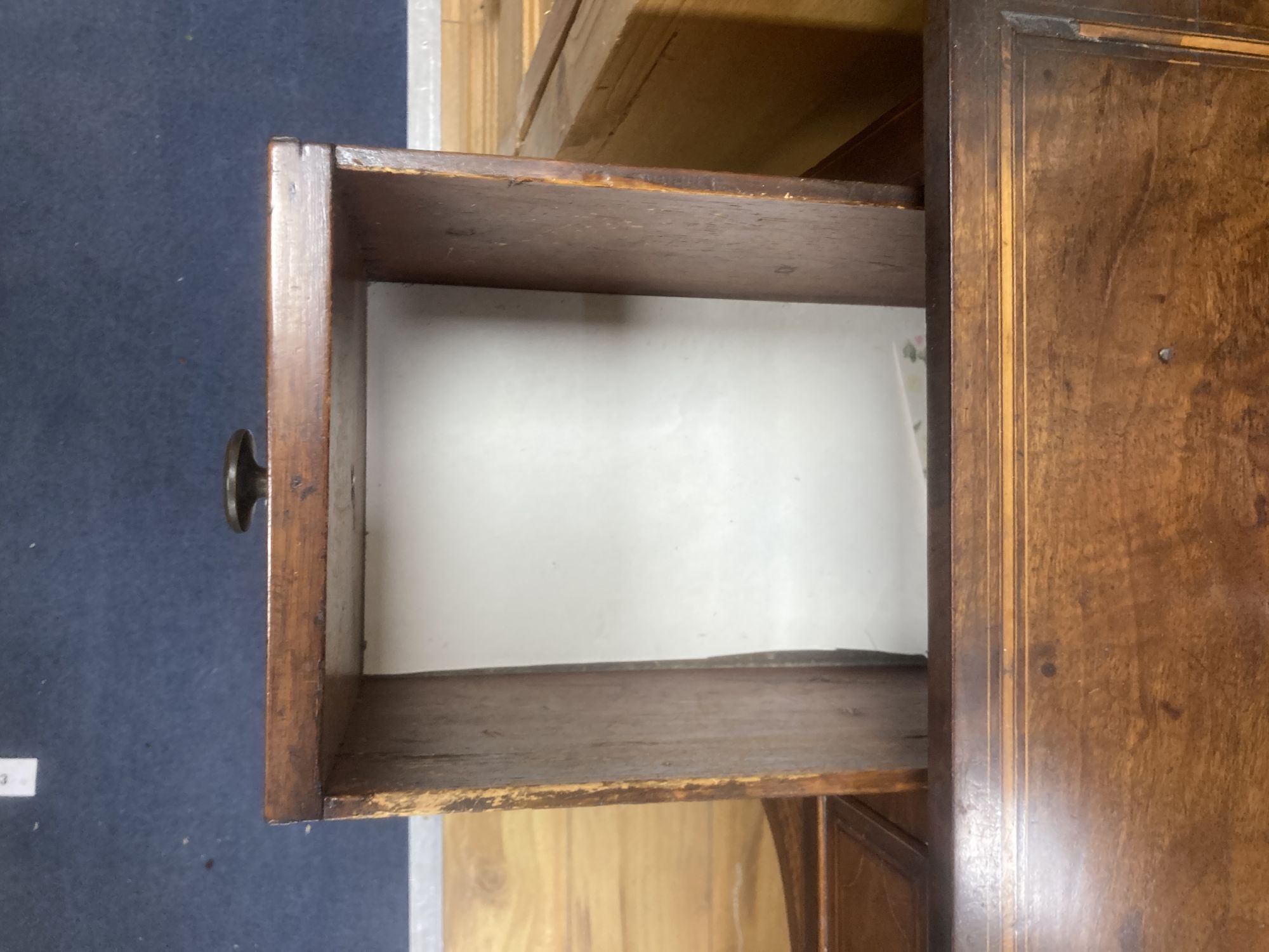 A George III inlaid mahogany kneehole dressing table, width 92cm, depth 50cm, height 140cm